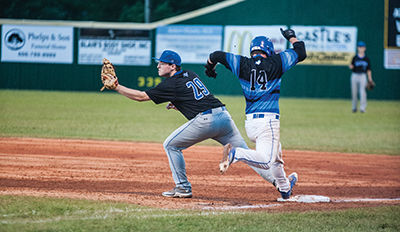Jonathan McKenzie attempts to make it to first base